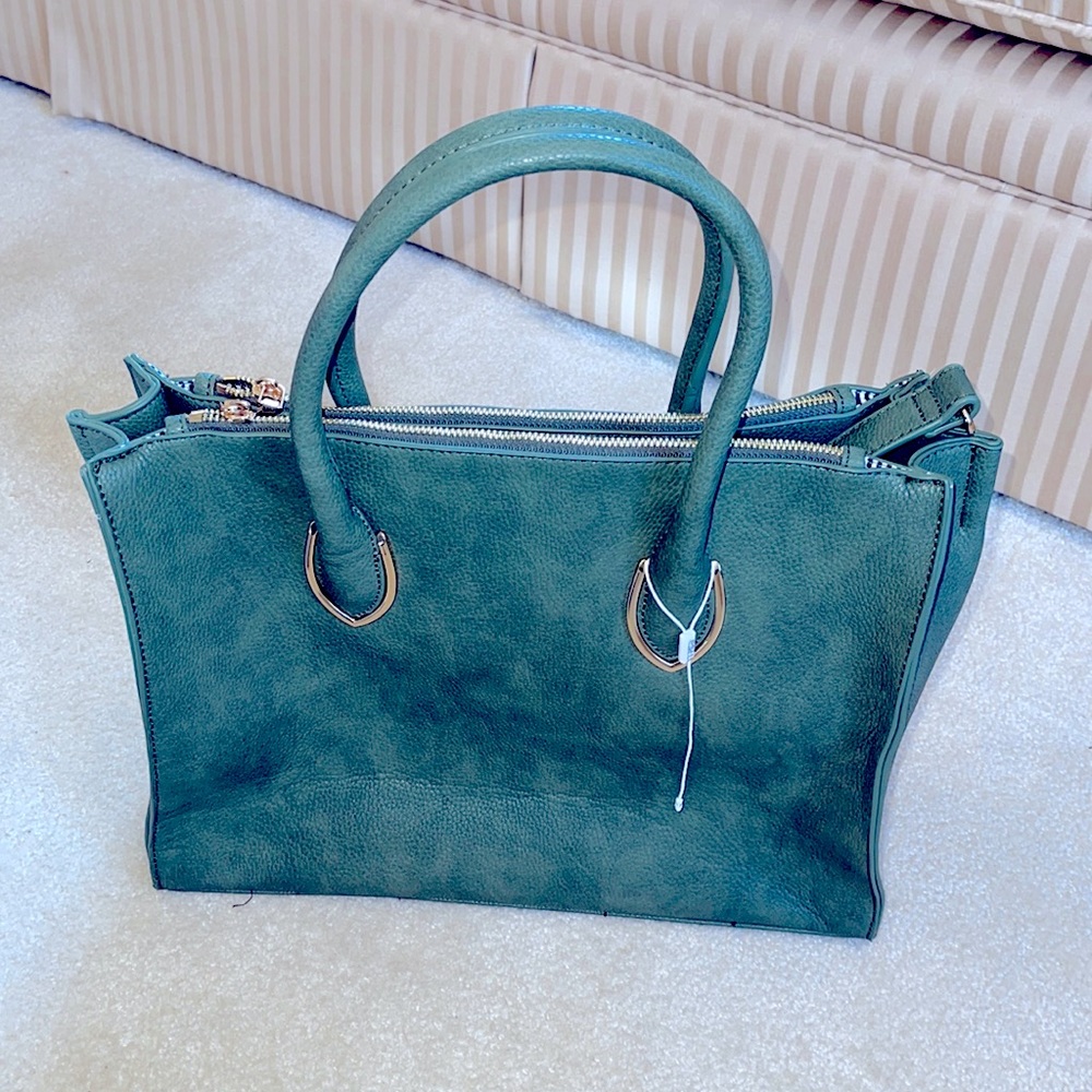 Large green Urban Expression handbag.